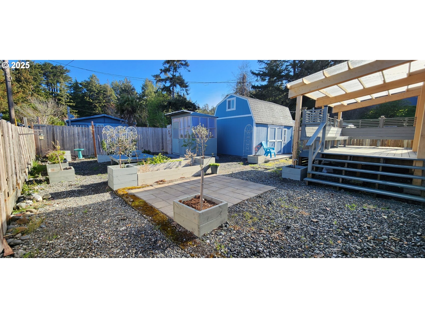 94273 Leith Road Gold Beach, OR 97444 - Photo 16 of 20 a view of a backyard with sitting area