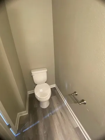 a bathroom with a toilet