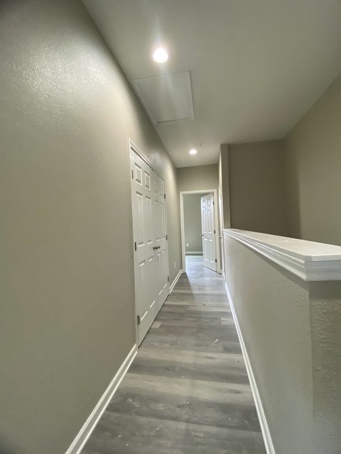 1305 West Villa Maria Road, Unit D103 Bryan, TX 77801 - Photo 8 of 12 a view of hallway with stairs