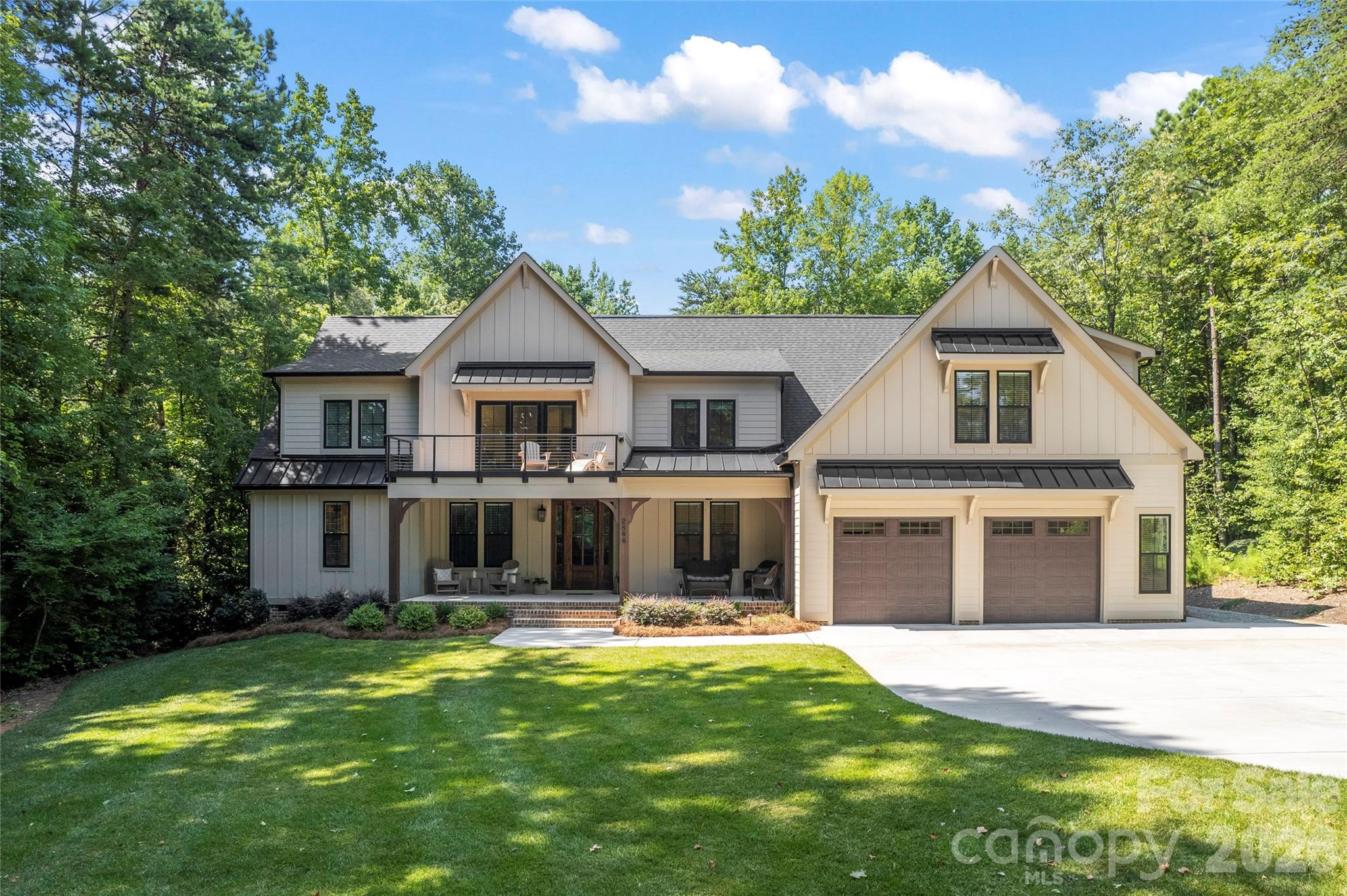 2866 Backwoods Trail Denver, NC 28037 - Photo 1 of 44 a front view of a house with a yard