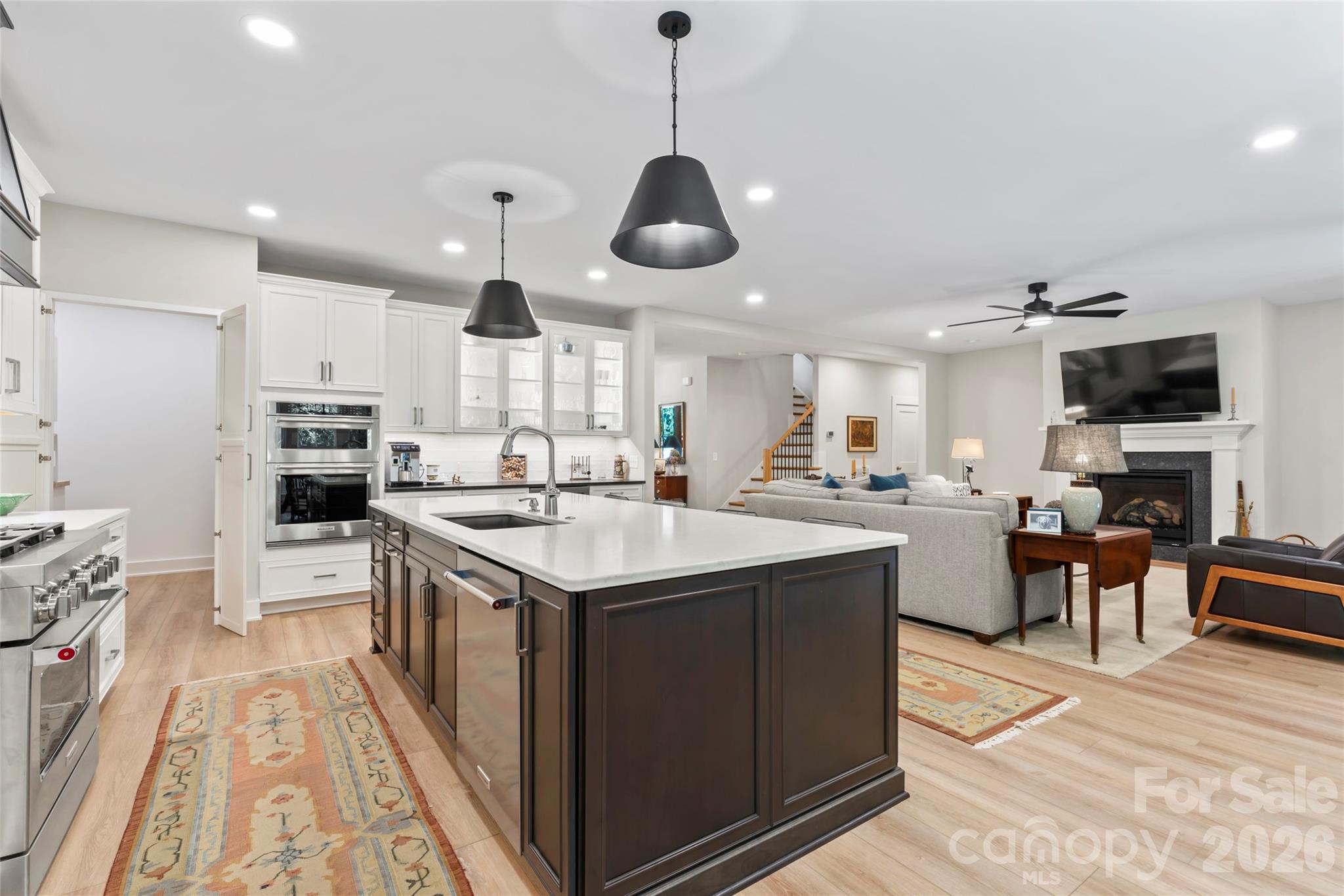 2866 Backwoods Trail Denver, NC 28037 - Photo 13 of 44 a kitchen with stainless steel appliances granite countertop a sink stove and refrigerator