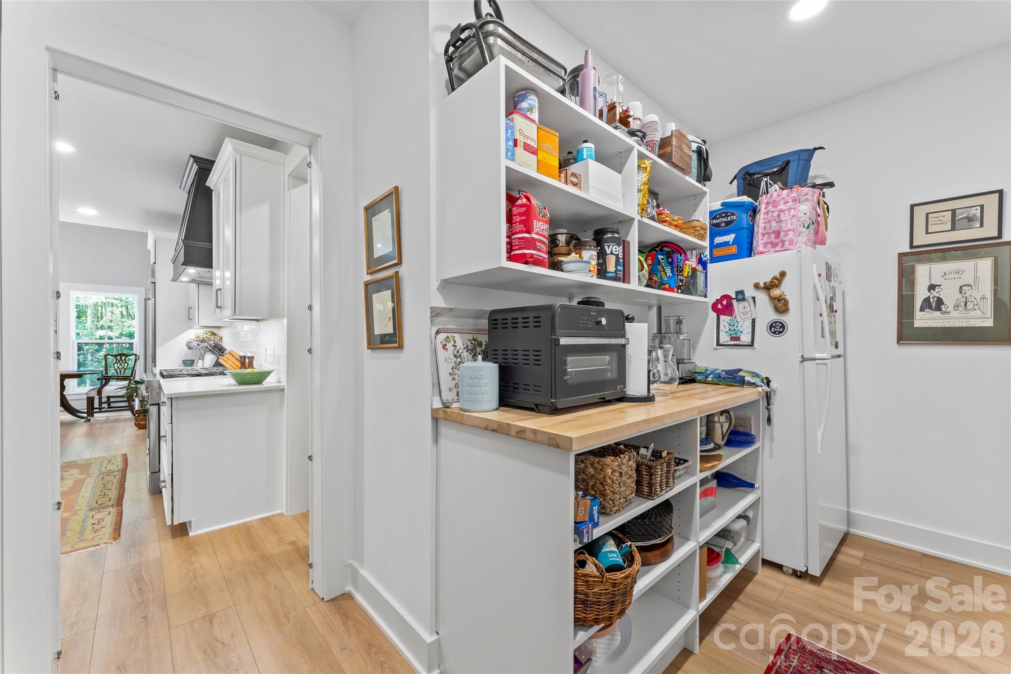2866 Backwoods Trail Denver, NC 28037 - Photo 14 of 44 a room with furniture and a book shelf