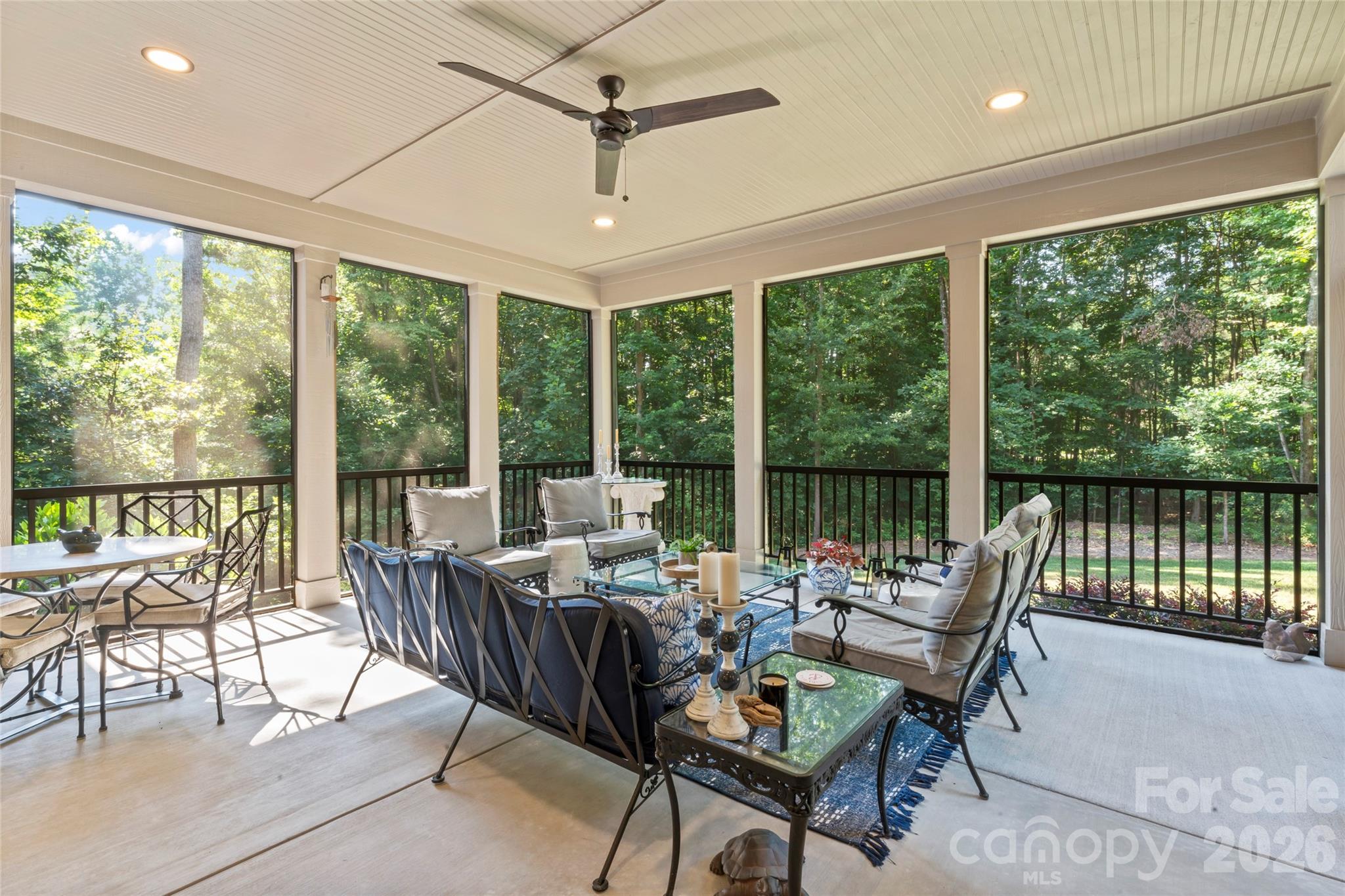 2866 Backwoods Trail Denver, NC 28037 - Photo 16 of 44 a living room with furniture and floor to ceiling windows