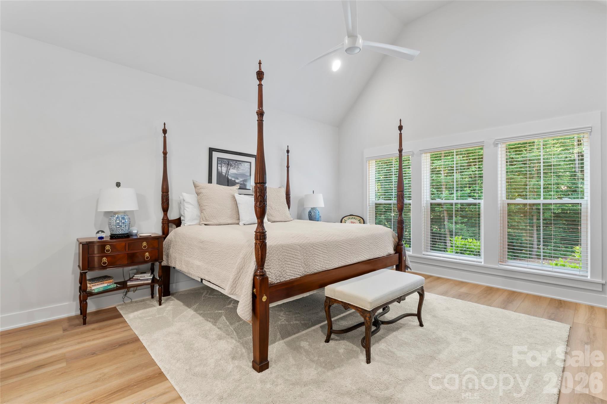 2866 Backwoods Trail Denver, NC 28037 - Photo 18 of 44 a bedroom with a bed a chair and a large window