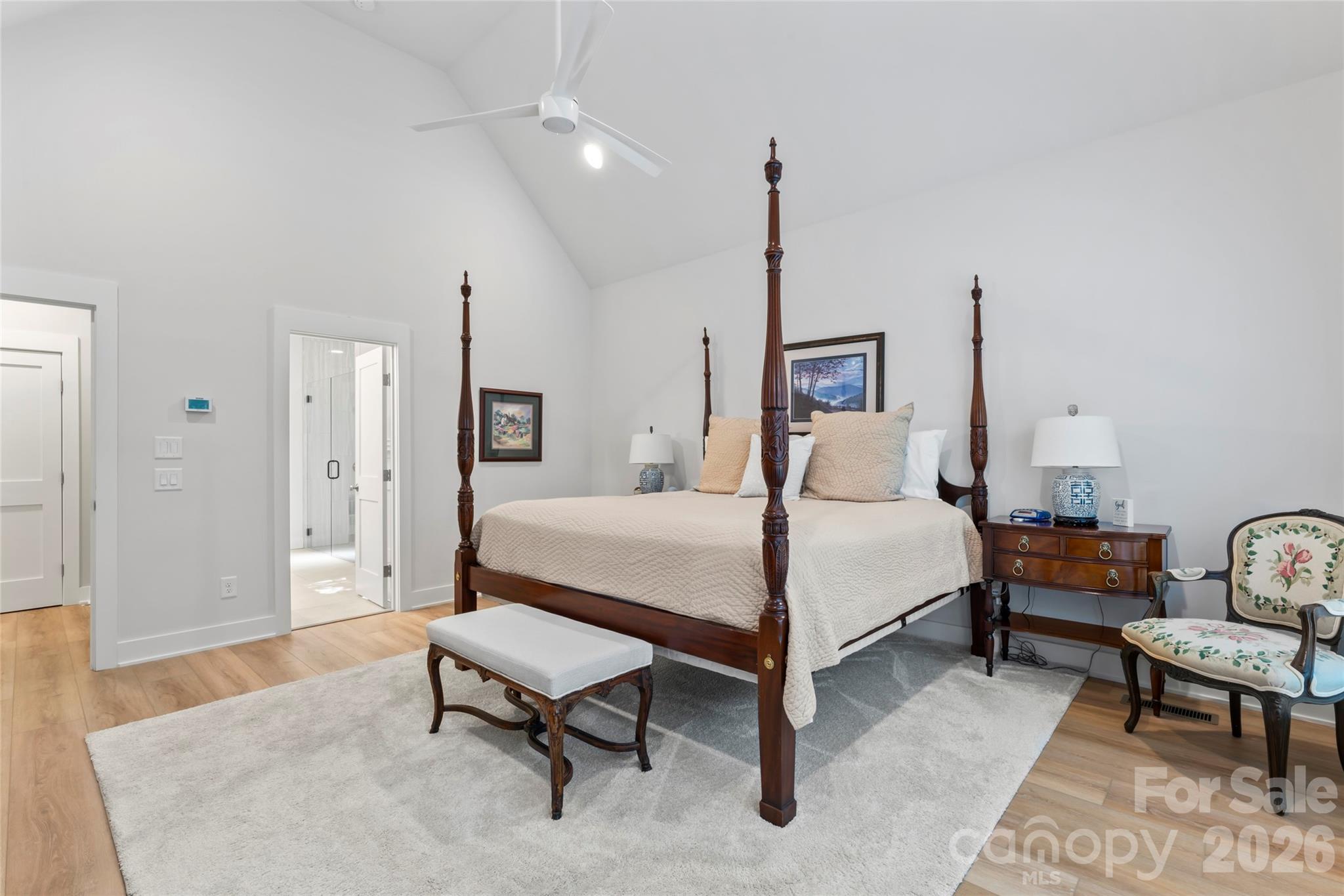 2866 Backwoods Trail Denver, NC 28037 - Photo 19 of 44 a bedroom with a bed a table and painting