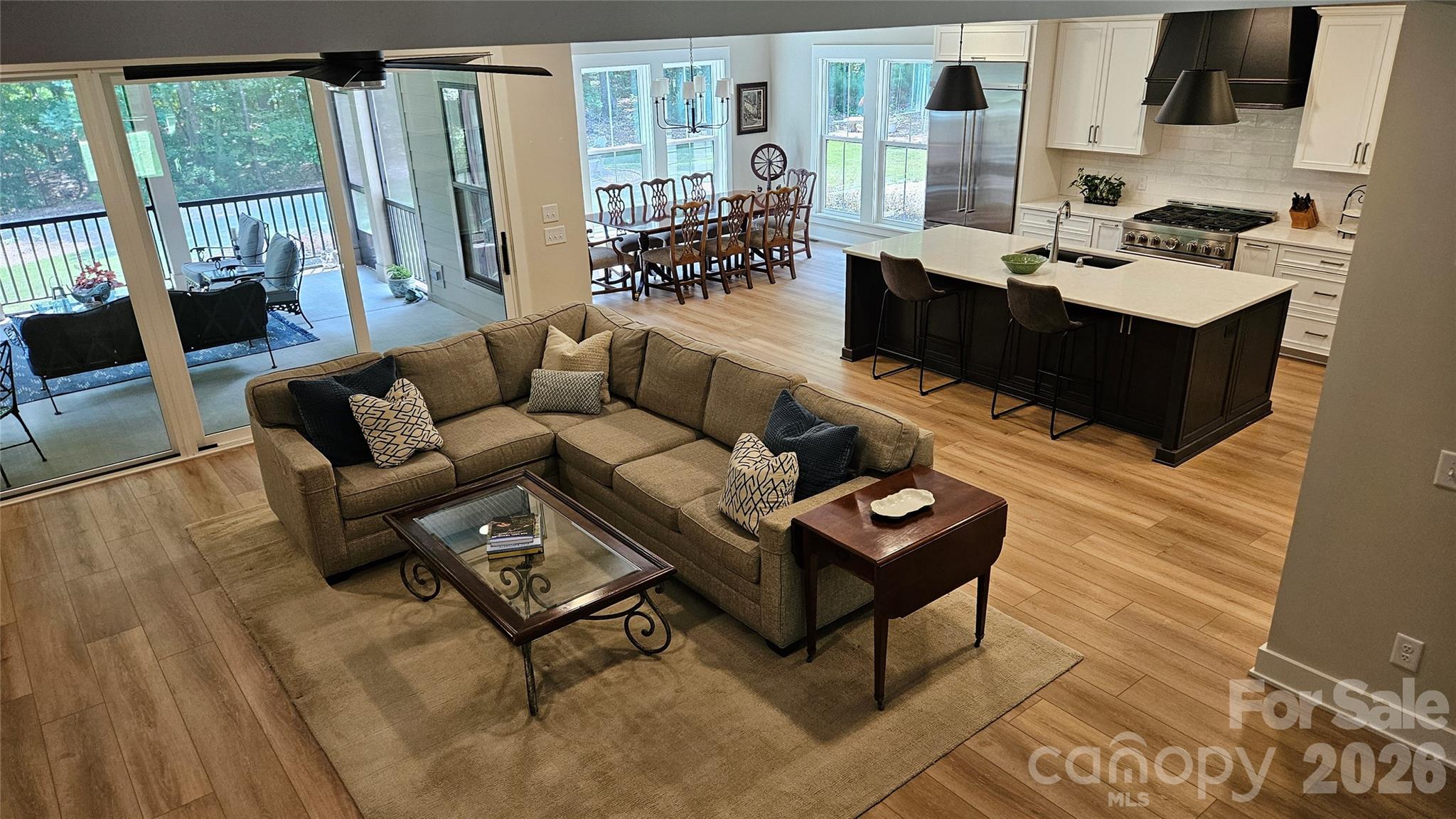 2866 Backwoods Trail Denver, NC 28037 - Photo 20 of 43 a living room with furniture and a flat screen tv
