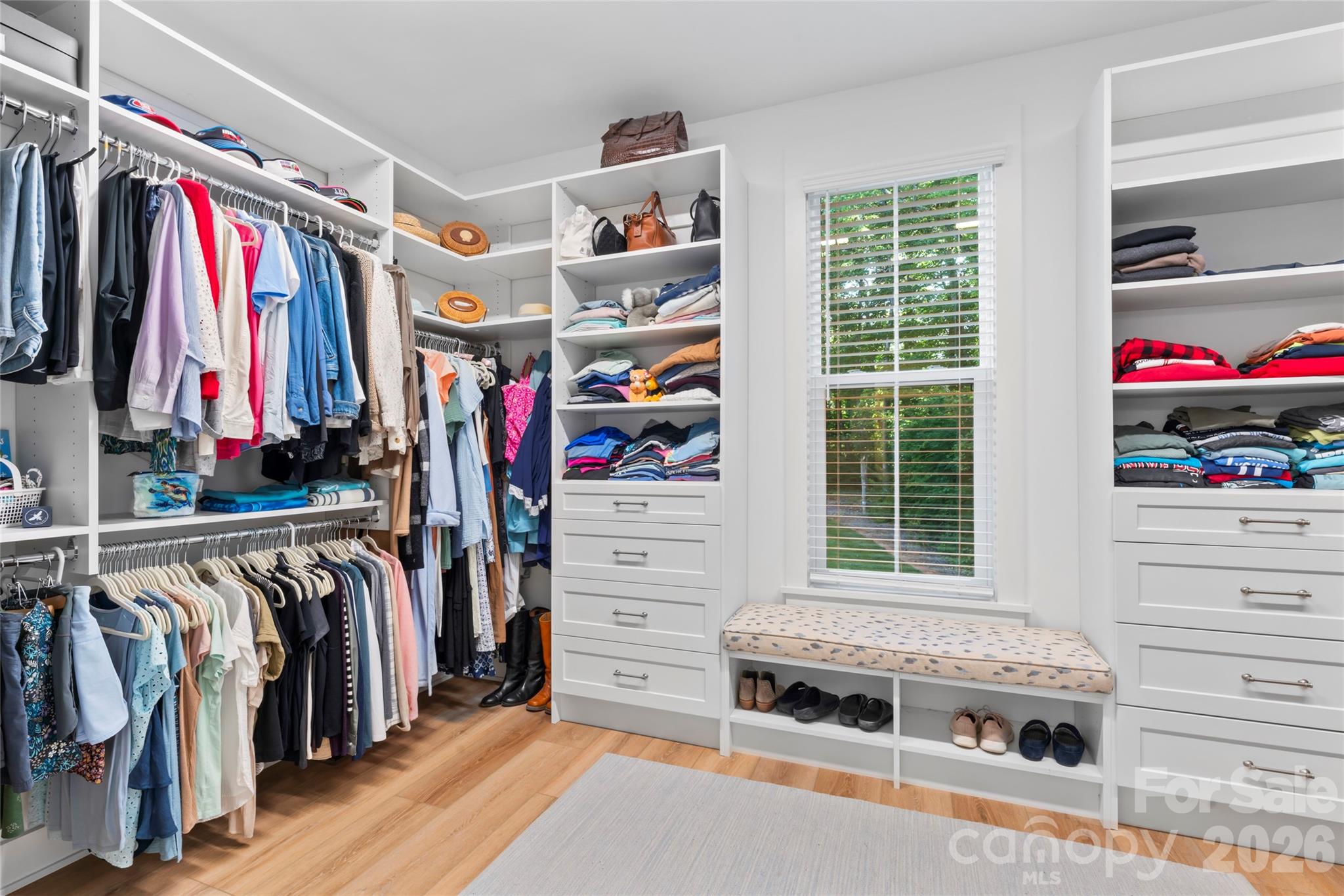 2866 Backwoods Trail Denver, NC 28037 - Photo 21 of 42 a view of walk in closet with clothes and shoes