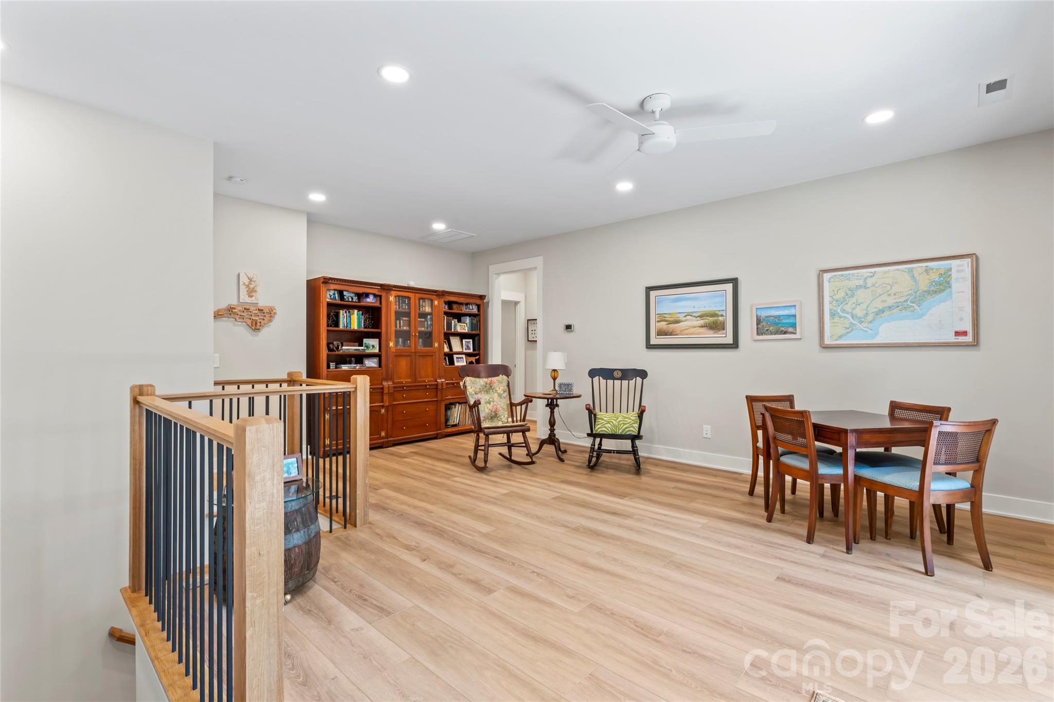 2866 Backwoods Trail Denver, NC 28037 - Photo 24 of 44 a view of a dining room with furniture and wooden floor