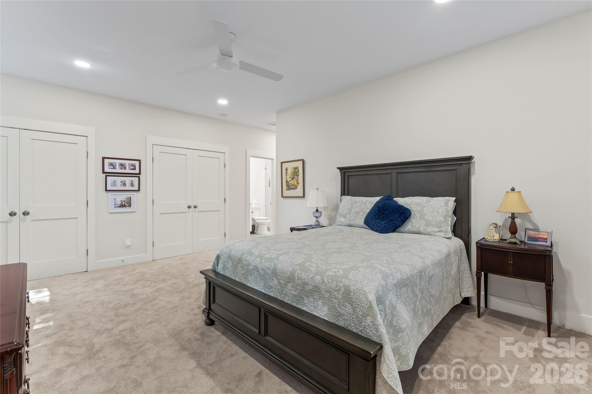 2866 Backwoods Trail Denver, NC 28037 - Photo 29 of 44 a bedroom with a bed and a lamp