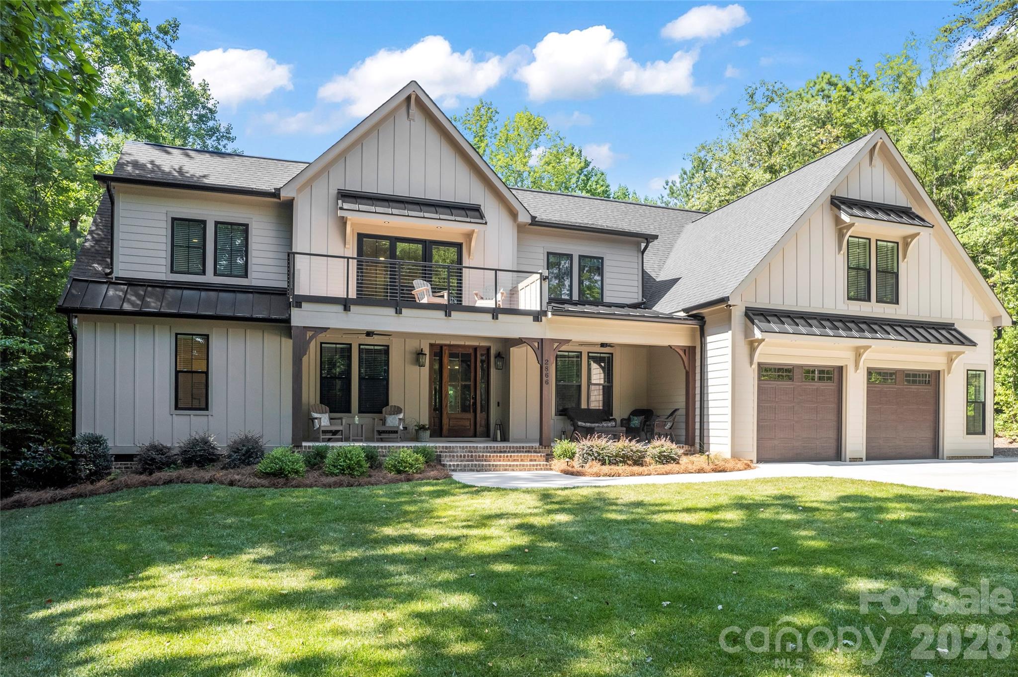 2866 Backwoods Trail Denver, NC 28037 - Photo 3 of 44 a front view of a house with a yard