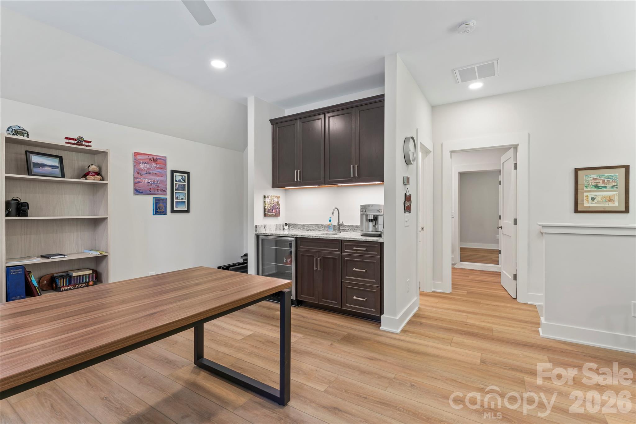 2866 Backwoods Trail Denver, NC 28037 - Photo 34 of 44 a living room with furniture and a flat screen tv