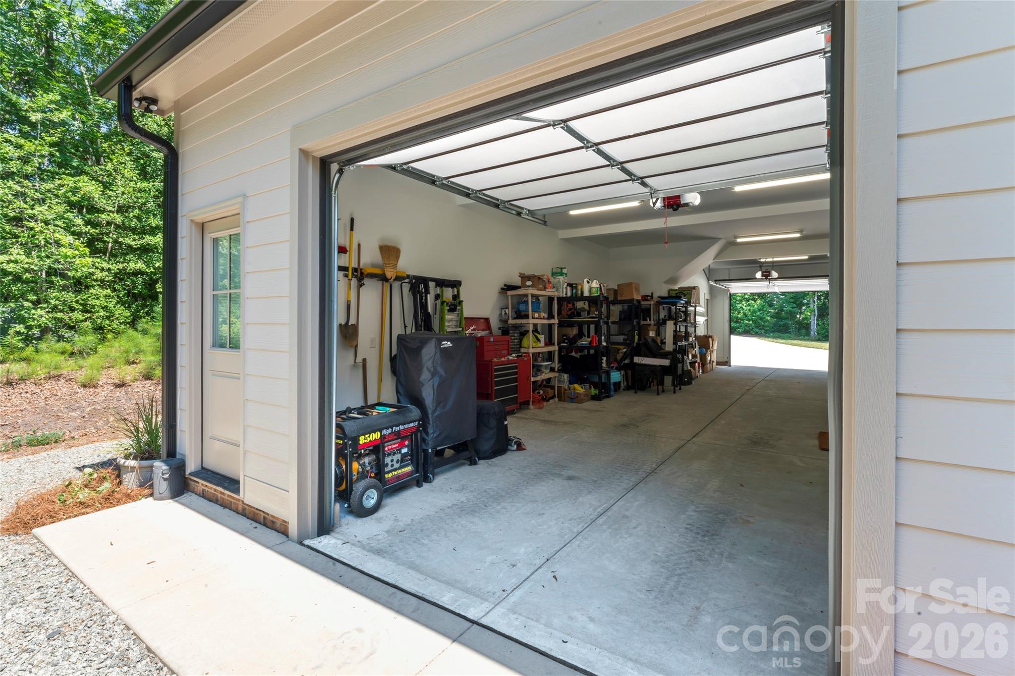 2866 Backwoods Trail Denver, NC 28037 - Photo 40 of 44 a view of a garage with stuff