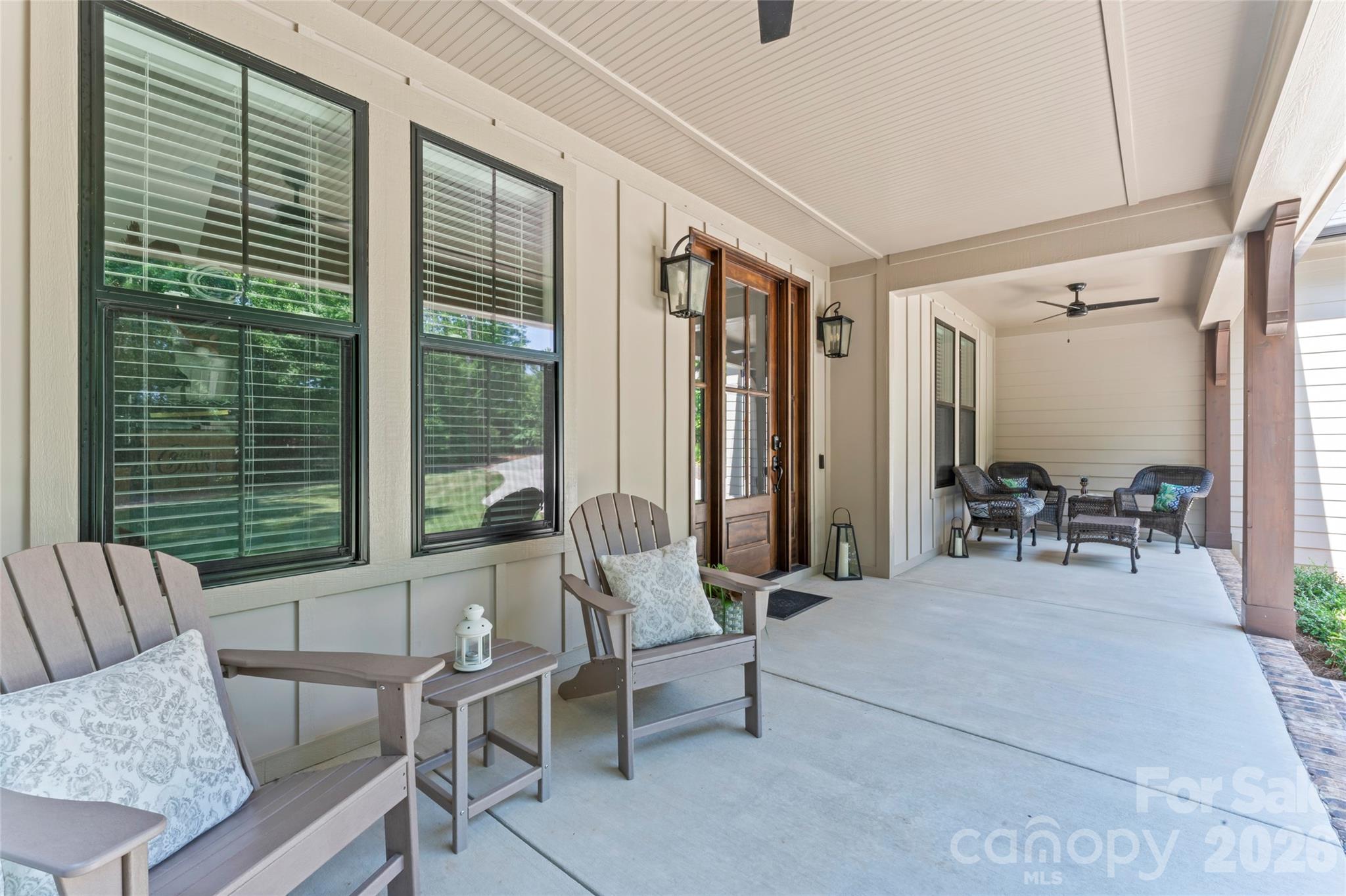 2866 Backwoods Trail Denver, NC 28037 - Photo 5 of 44 a living room with furniture and large windows