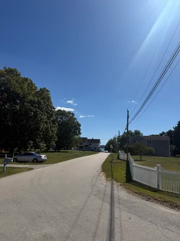 a view of a street with an outdoor space