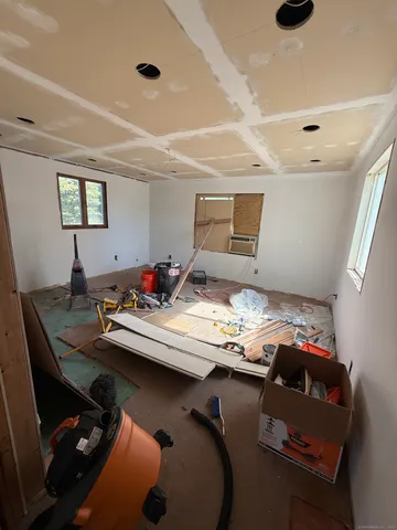 a view of a workspace with furniture