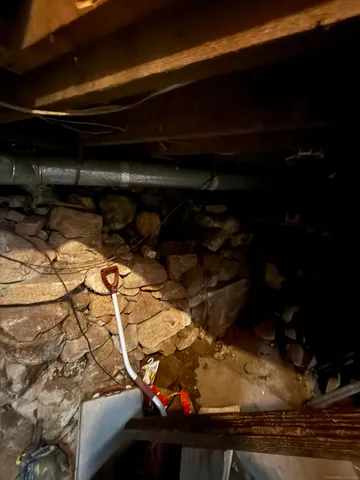 a room with gym equipment and a window