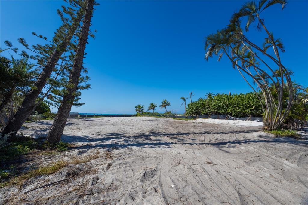 6429 Gulfside Road Longboat Key, FL 34228 - Photo 15 of 20 a view of a dry yard with wooden fence