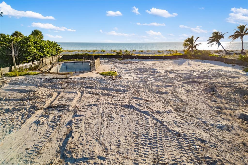 6429 Gulfside Road Longboat Key, FL 34228 - Photo 5 of 20 a view of a lake with a nearby beach