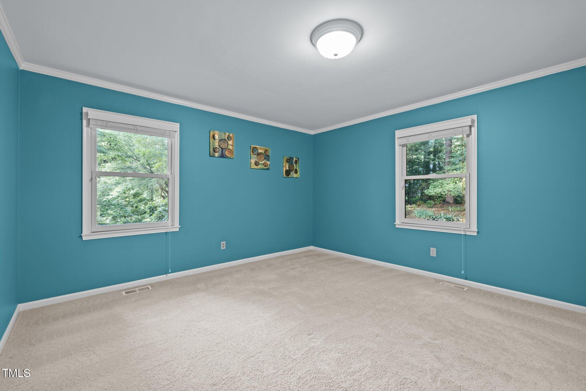 6925 Valley Lake Drive Raleigh, NC 27612 - Photo 19 of 50 a view of a big room with window