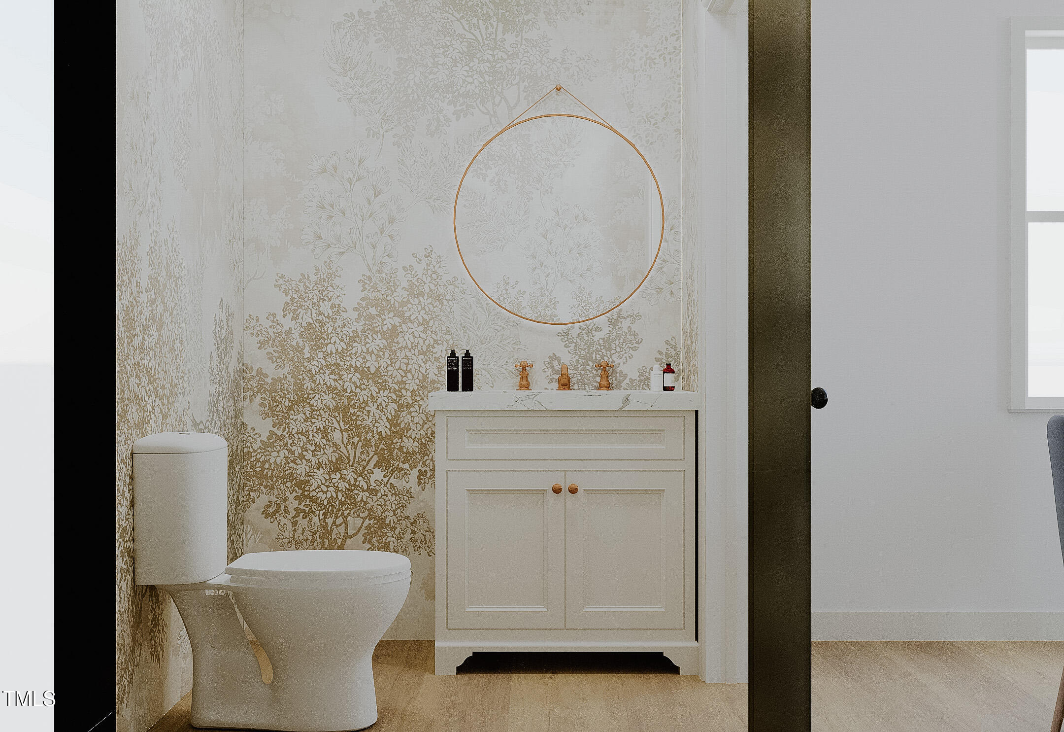 6925 Valley Lake Drive Raleigh, NC 27612 - Photo 33 of 50 a bathroom with a toilet a sink and a mirror