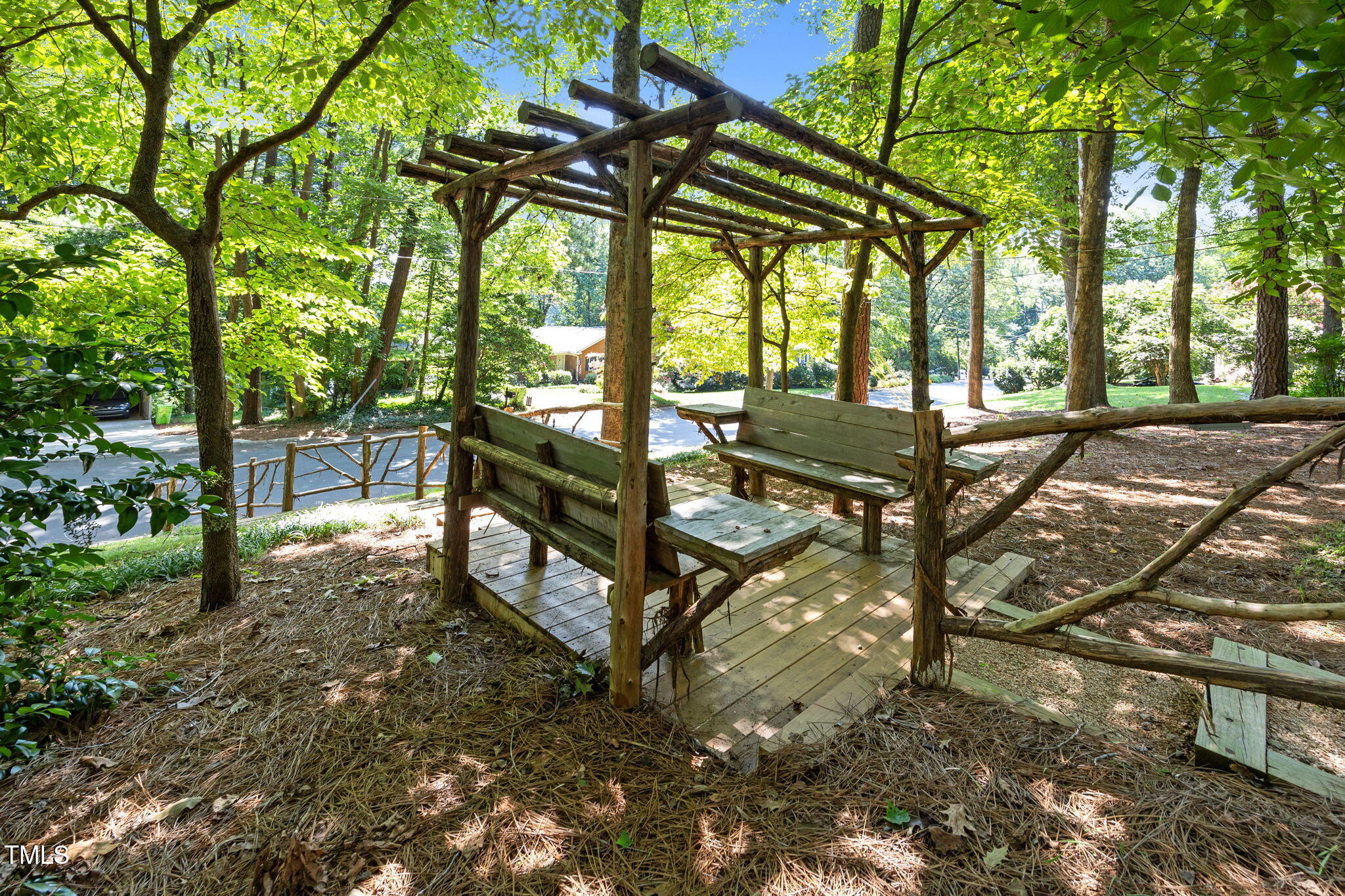 6925 Valley Lake Drive Raleigh, NC 27612 - Photo 4 of 50 a view of an outdoor space with seating area