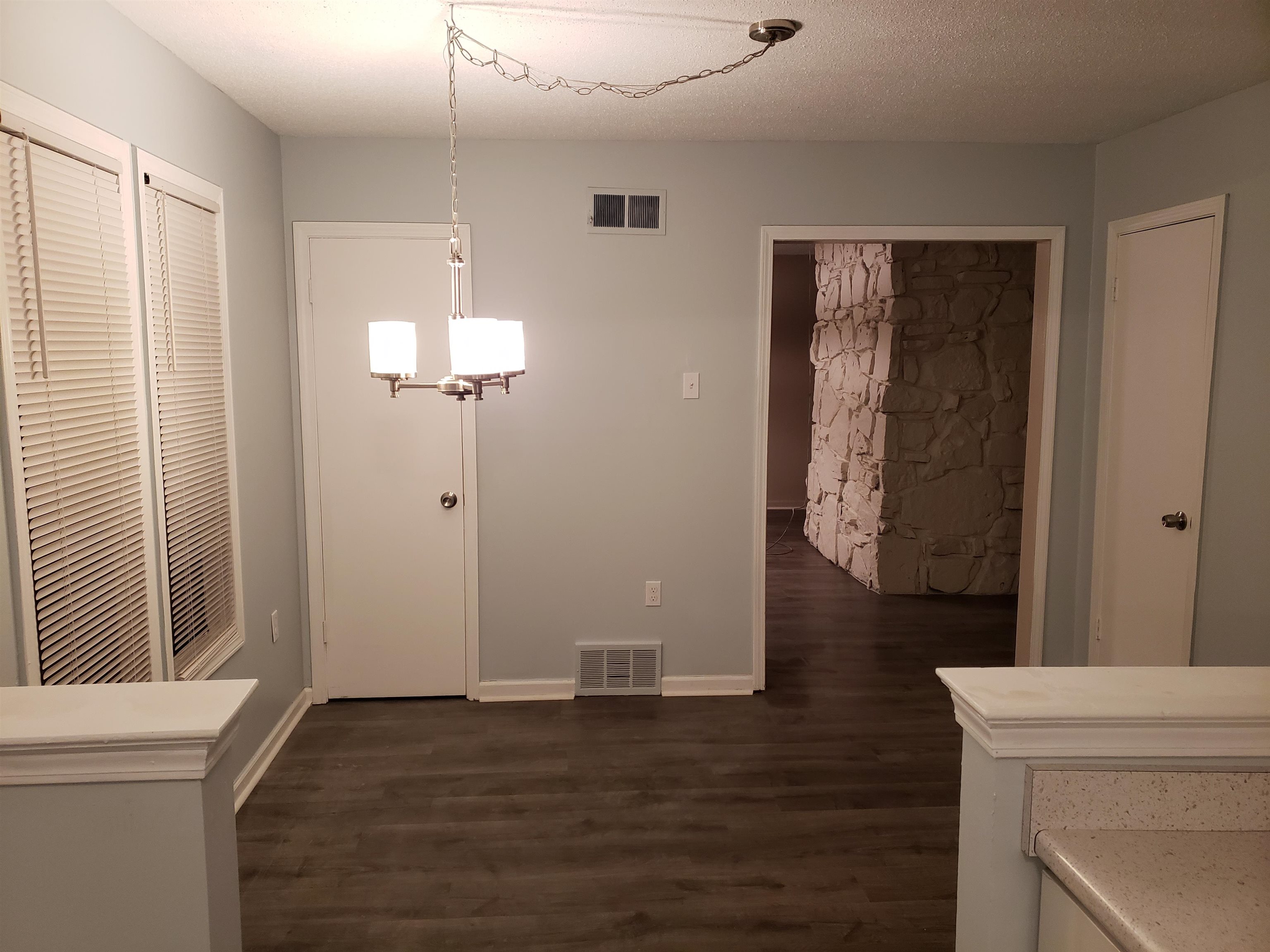 2596 Lynnfield Road Memphis, TN 38119 - Photo 22 of 23 a view of empty room with wooden floor and cabinet
