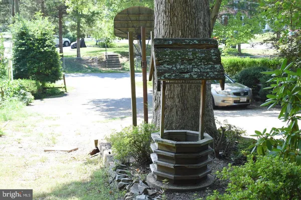 a view of a fountain in the yard