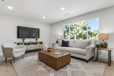 a bathroom with a sink vanity and a mirror
