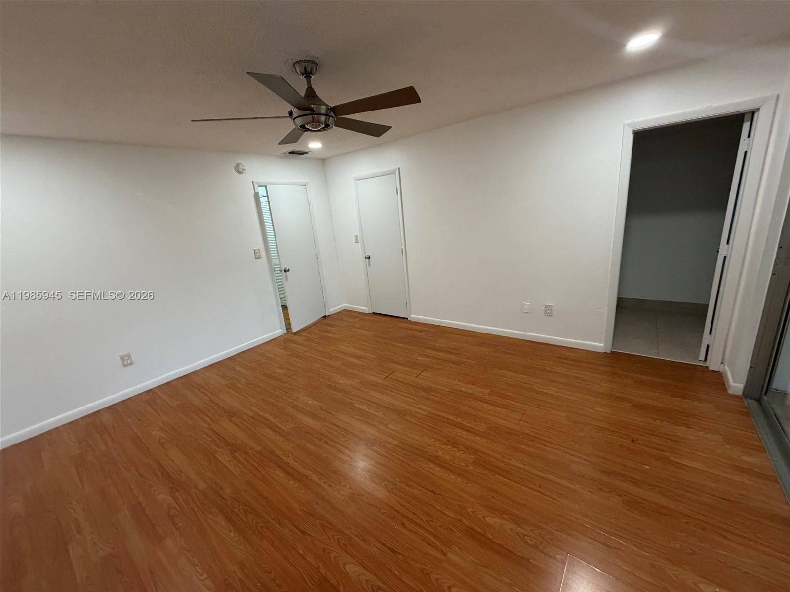 3962 Inverrary Drive, Unit A3 Lauderhill, FL 33319 - Photo 30 of 42 wooden floor in an empty room