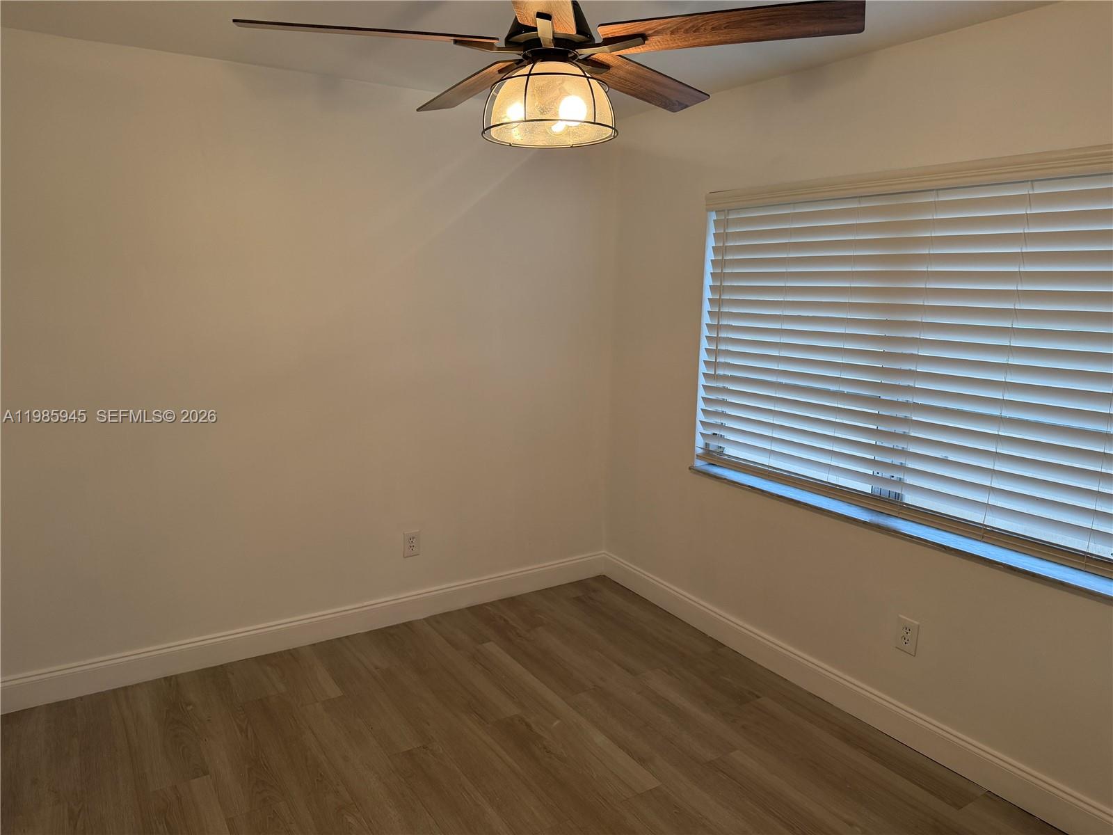 3962 Inverrary Drive, Unit A3 Lauderhill, FL 33319 - Photo 7 of 42 a view of an empty room with a window