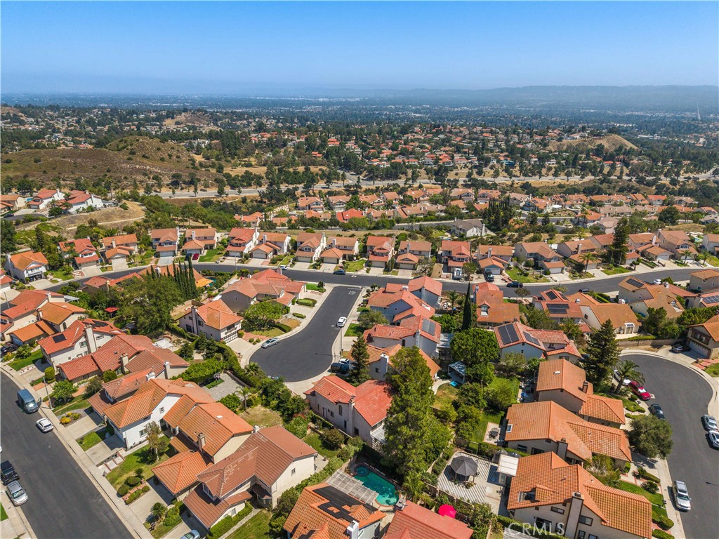 12065 Shadow Glen Lane Porter Ranch, CA 91326 - Photo 42 of 46 an aerial view of residential houses with outdoor space