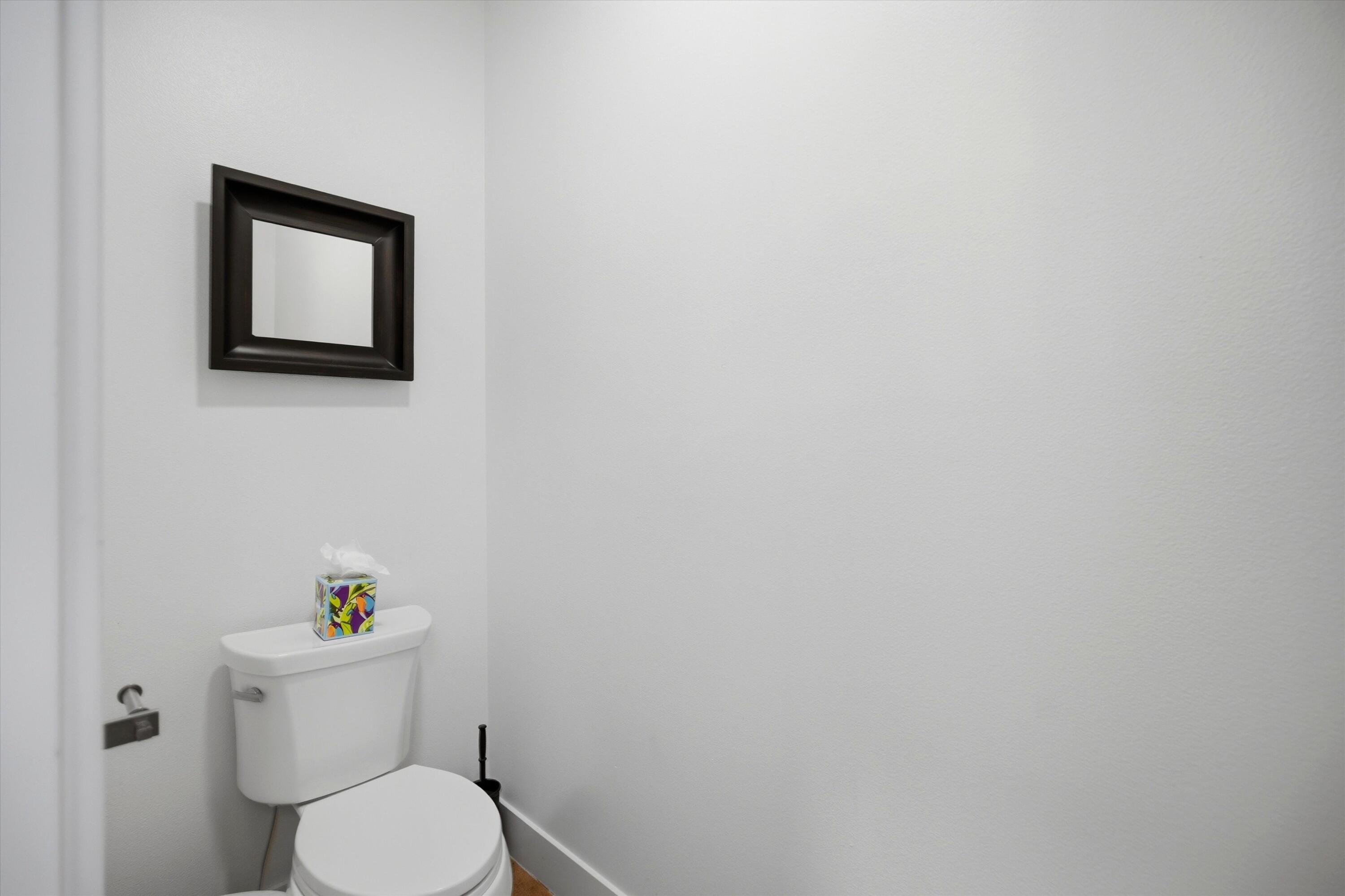 15 Southwest Quail Butte Place Bend, OR 97703 - Photo 26 of 55 a white toilet sitting next to a white wall