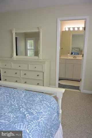 a view of a glass door with a yard from a living room