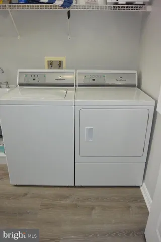 a view of bathroom with bathtub and window