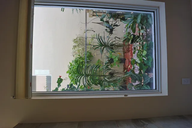 a bedroom with a bed and cabinets