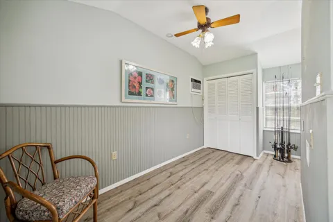 a view of workspace with wooden floor