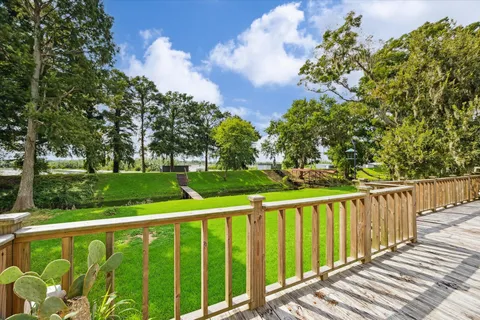 a view of a deck with a yard