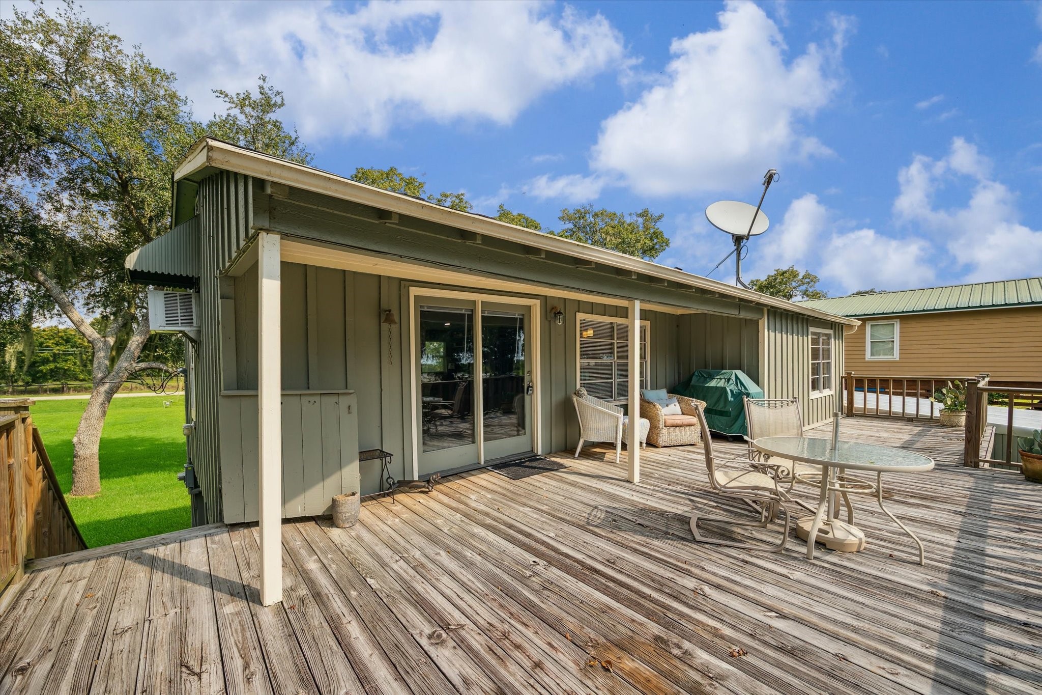 29331 County Road 25 Damon, TX 77430 - Photo 18 of 26 a house view with a seating space and garden space