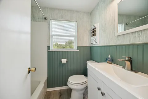 a bathroom with a sink and a toilet