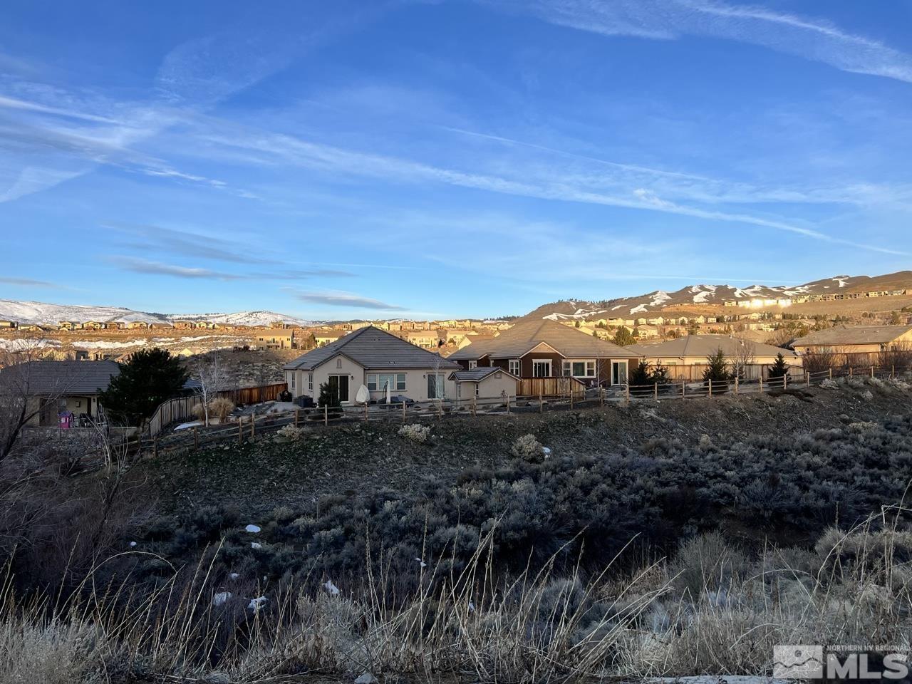 1765 Scott Valley Road Reno, NV 89523 - Photo 21 of 23 a view of a large building with a mountain in the background
