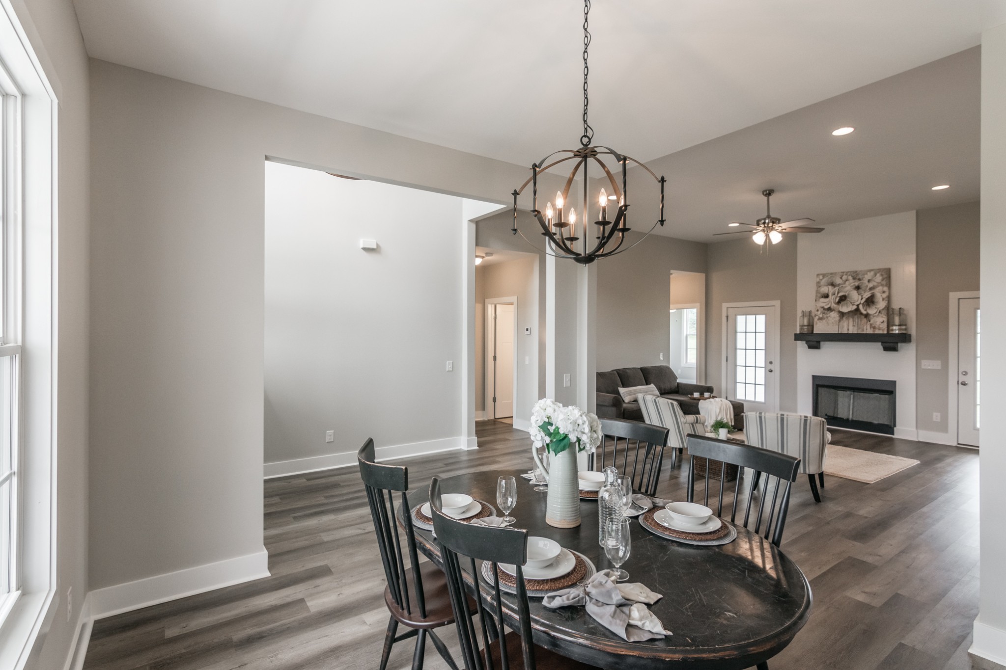 7866 Mill Road Cross Plains, TN 37049 - Photo 11 of 42 a view of a dining room with furniture wooden floor and chandelier