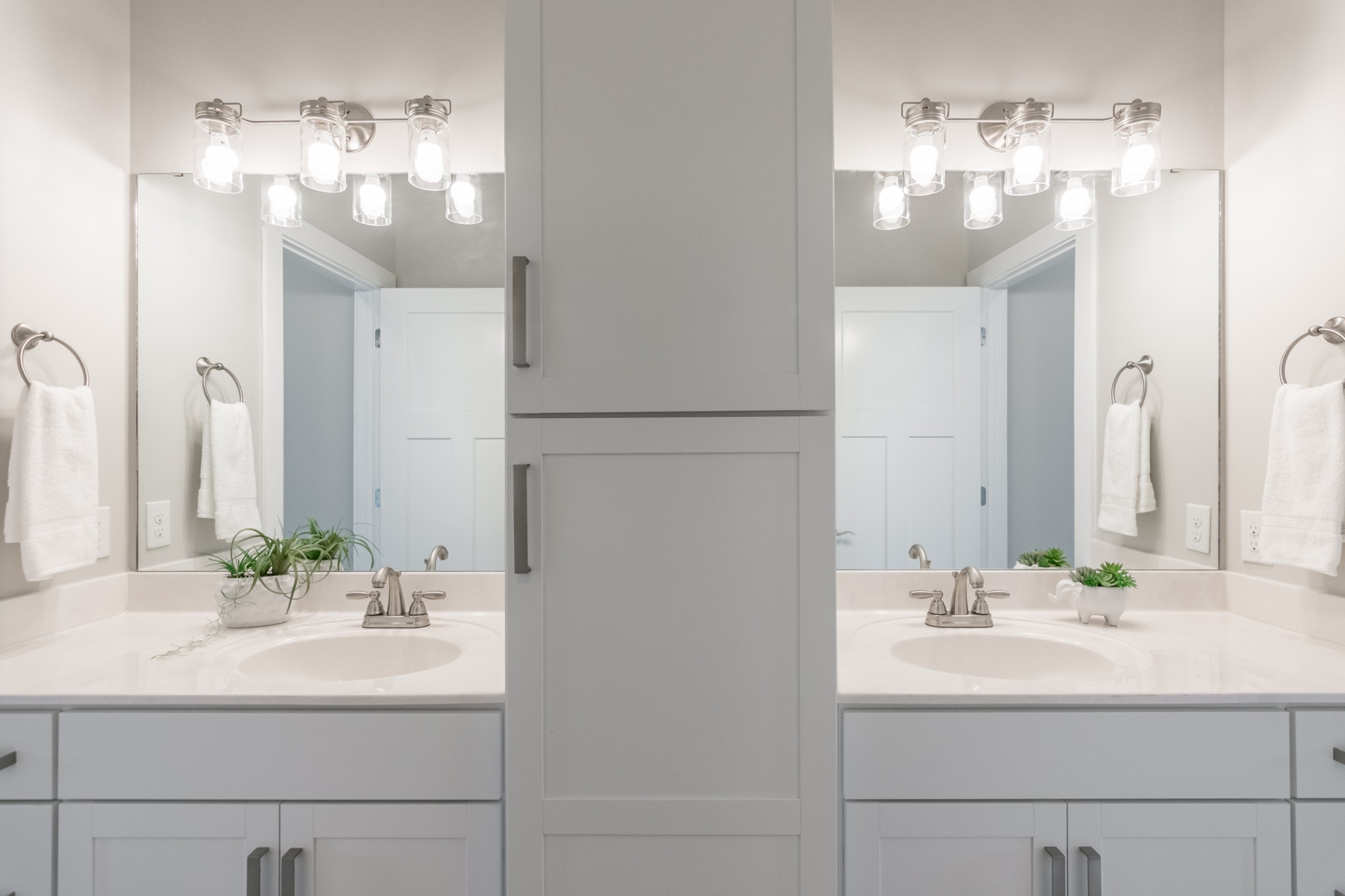 7866 Mill Road Cross Plains, TN 37049 - Photo 36 of 42 a bathroom with a sink vanity and a mirror