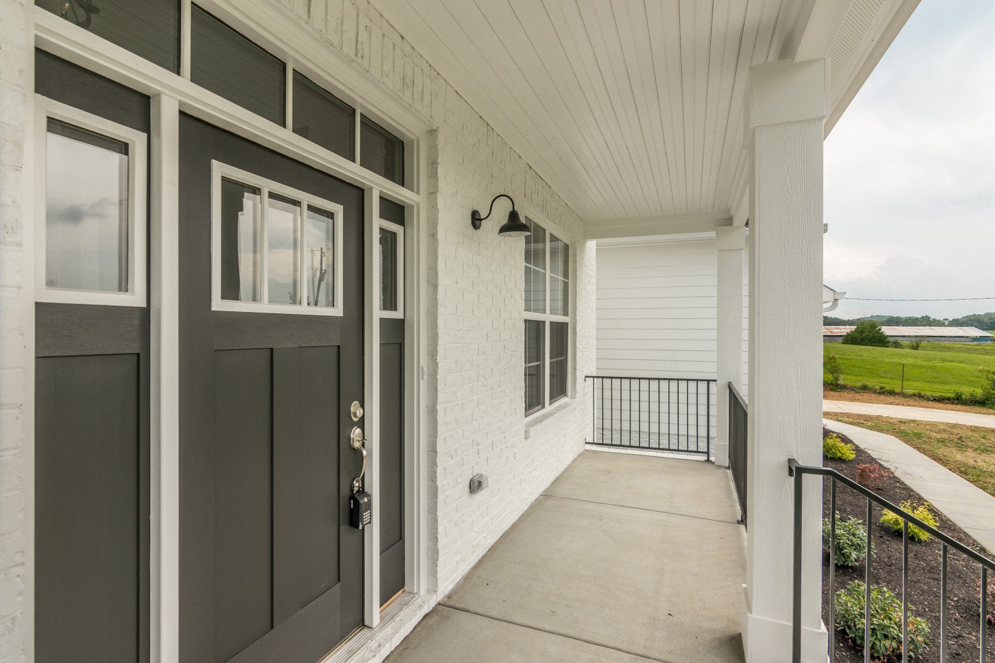 7866 Mill Road Cross Plains, TN 37049 - Photo 8 of 42 a view of a balcony from door