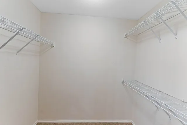 a view of a room with racks on the wall