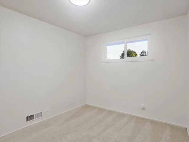 an empty room with a hallway