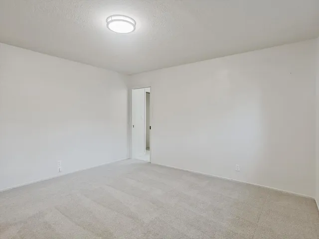 a bathroom with a double vanity sink and mirror