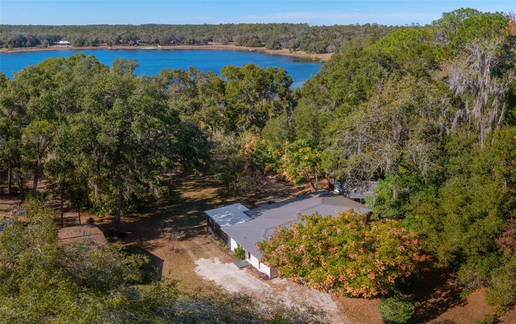 113 Stock Avenue Interlachen, FL 32148 - Photo 1 of 62 a view of a lake with mountains in the background