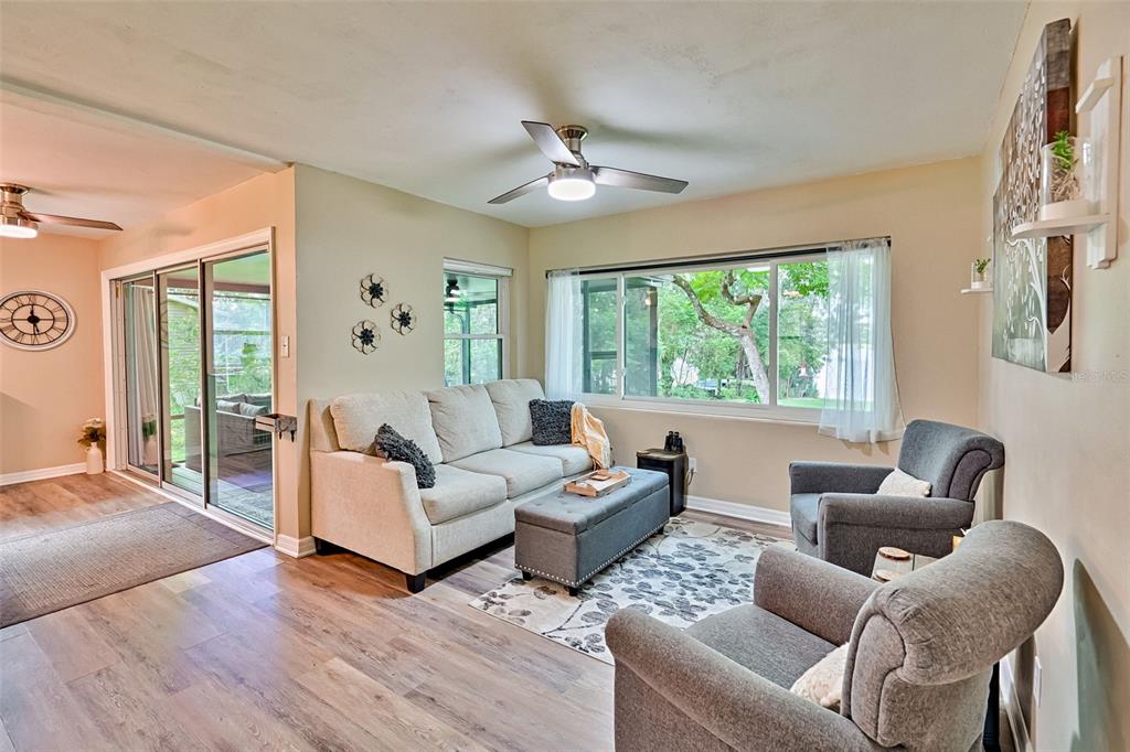 113 Stock Avenue Interlachen, FL 32148 - Photo 18 of 62 a living room with furniture and a large window