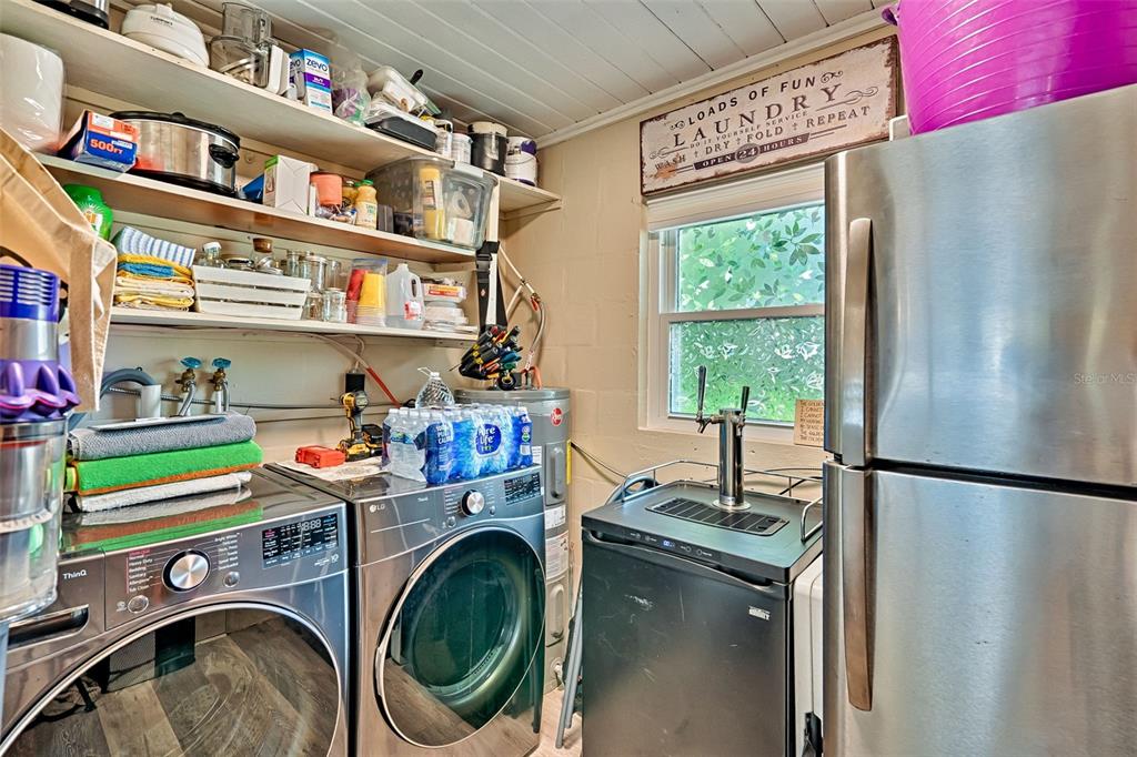 113 Stock Avenue Interlachen, FL 32148 - Photo 26 of 62 a utility room with dryer and washer