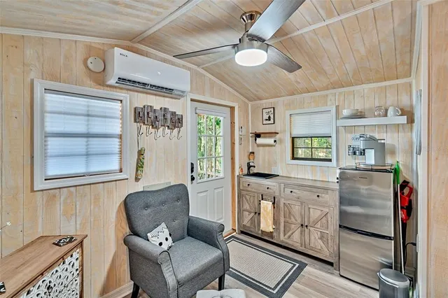 a view of a lake in middle of the forest